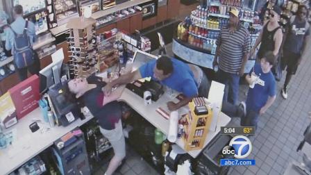This still image from surveillance footage shows a customer punching a clerk at a Chevron gas station in Lakewood in September 2013.
