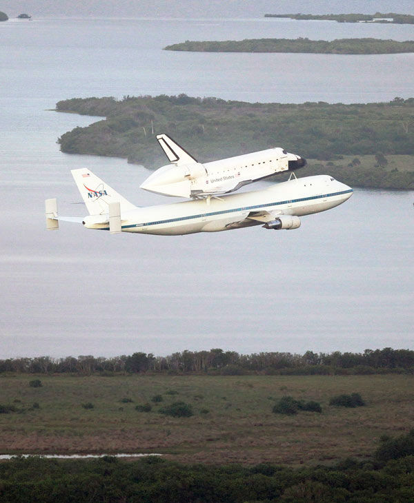 Space shuttle Endeavour makes its departure atop...