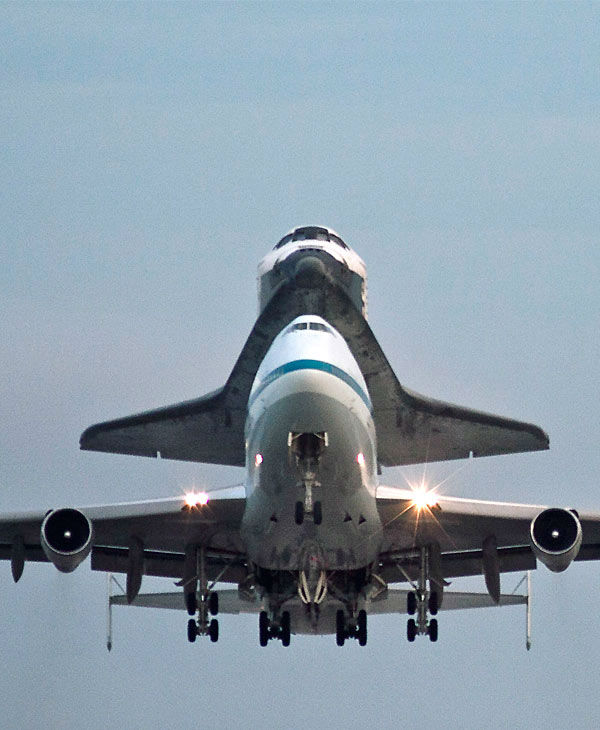 Space shuttle Endeavour atop a modified jumbo...