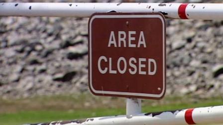A closed sign at a state park is shown in this undated file photo.