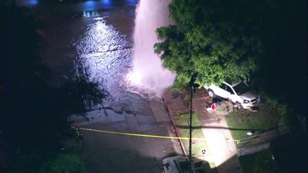 The driver of a white SUV plowed into a fire hydrant and power pole in Valley Village on Wednesday, Aug. 22, 2012. Two Good Samaritans were killed trying to help the driver.