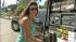Overnight gas price hike disturbs CA drivers :: A woman is seen at a gas pump in this undated file photo.