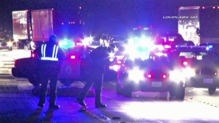 The CHP is seen on the 210 Freeway in Irwindale after a man was fatally struck by several cars on Saturday, Oct. 6, 2012.