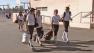 Organizers of an MLK weekend girls softball tournament said their games were canceled by the LAUSD. Softball players walk from game on Monday, Jan. 21, 2013.