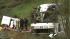 Investigators are seen combing through the...