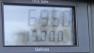 A gas pump is seen keeping track of the price of gas.