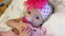 5-month-old Paisley Mae Arnold is seen just before a heart transplant surgery on Saturday, March 16, 2013.