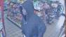 Still from surveillance footage shows a robbery suspect at a gas station in San Bernardino on Sunday, Mach 24, 2013.