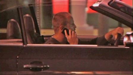 A distracted driver is seen.