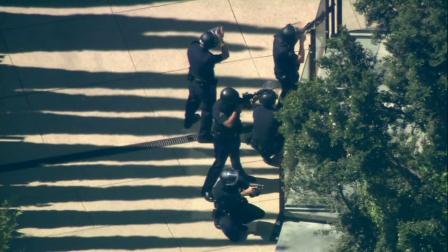 Authorities are seen in this undated image during a swatting incident at a celebritys home in Los Angeles.