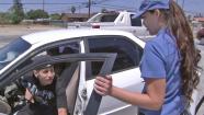 A driver is greeted with free gas at a gas station in Moreno Valley on Friday, May 24, 2013.