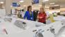 A woman shops for appliances.