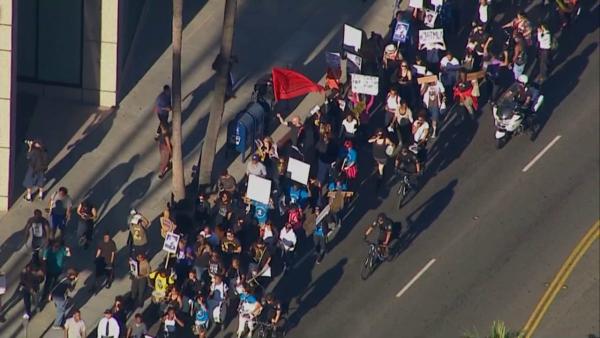 More than 100 marchers protesting the acquittal of George Zimmerman in the Trayvon Martin case took to the streets of Beverly Hills on Wednesday, July 17, 2013.