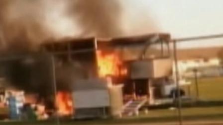 A still from footage shows a fire caused by a propane tank explosion at a football game in Fresno on Friday, Sept. 13, 2013.