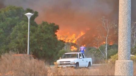 A fire burns near Camp Pendleton on Saturday, Oct. 5, 2013.