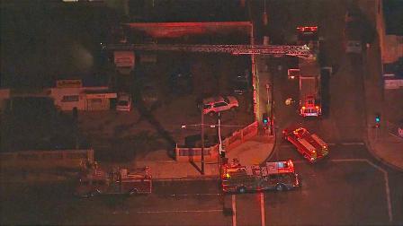 Fire crews at the scene of a fire at an auto body shop in Hawthorne on Friday, Nov. 1, 2013.