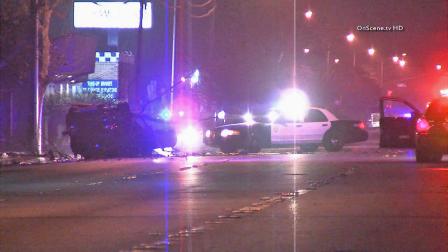 Police at the scene of a deadly car crash in Bellflower on Saturday, Jan. 4, 2014.