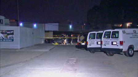 Authorities investigate the scene where a body found in Stanton on Saturday, Jan. 11, 2014.