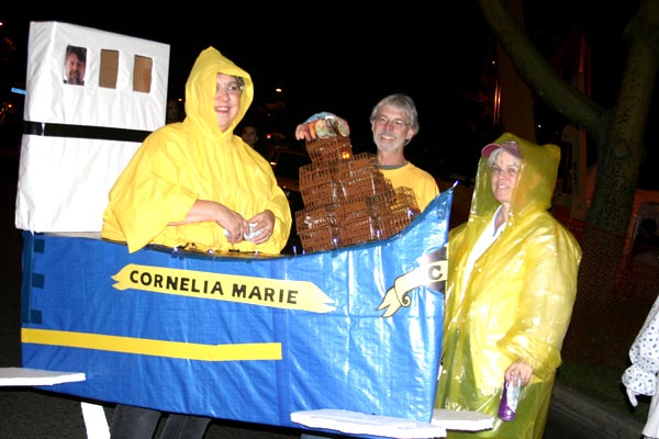 Revelers dressed in the theme of the fishing...