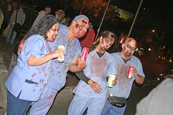 Revelers in zombie costumes at the West...