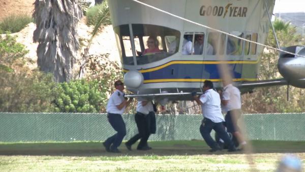 A crew pushes off the Goodyear Blimp during takeoff in this photo. ABC7 anchor Phillip Palmer got a chance to ride the iconic blimp, which is steeped in history reaching back to the 1930s when Goodyear built airships for the Navy.