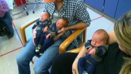 Brittany Deen and her triplets are shown in this photo. The boys may set a Guinness World Record for their total weight.