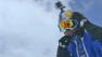 Russian extreme sports star Valery Rozov checks his helmet before he jumps from Mount Everest on Sunday, May 5, 2013.
