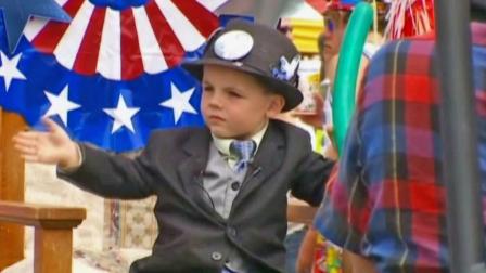Mayor Bobby Tufts, 4, is shown waving to a crowd in the northern Minnesota town of Dorset.