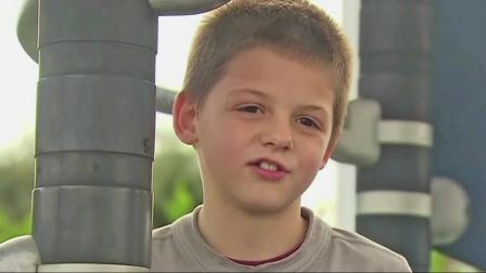 Simon Kruger, 7, is seen in this undated file photo. A kangaroo stayed with him through the night when he was lost in the Australian wilderness.