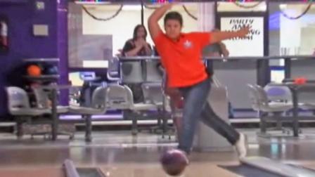 Hannah Diem, 9, strikes a pose after throwing a bowling ball. Diem became the youngest person to ever bowl a perfect 300.