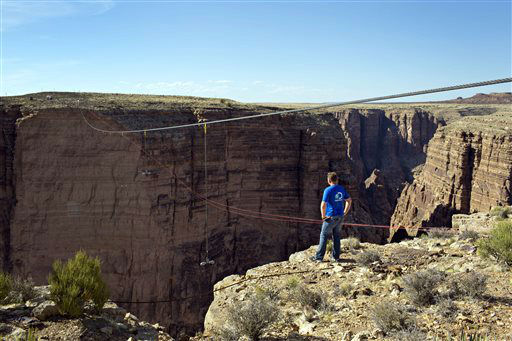 Aerialist Nik Wallenda looks across the canyon...