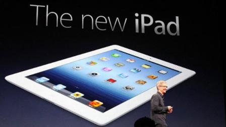 Apple CEO Tim Cook introduces the new iPad during an event in San Francisco, Wednesday, March 7, 2012.