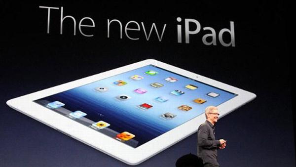 Apple CEO Tim Cook introduces the new iPad during an event in San Francisco, Wednesday, March 7, 2012.