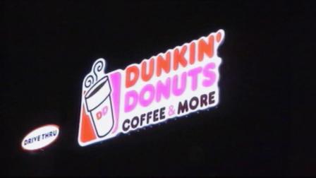 A Dunkin Donuts sign is seen in this undated file photo.