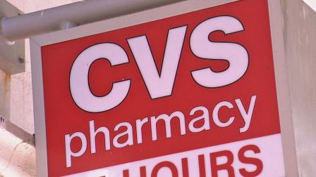 A sign for the pharmacy chain CVS is shown in this undated file photo.