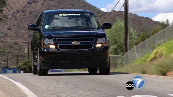 SUV Hybrid drives on the road