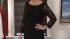 An elegant, form-fitting black dress should be...