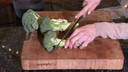 Broccoli is cut on a chopping board in this undated file photo.
