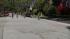 Casually pedaling through various neighborhoods,...