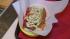 The Sooo Cali hot dog is piled high with fried...