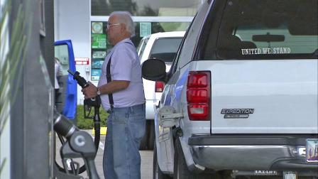 A man is seen pumping gas in the Los Angeles area in this undated file photo.