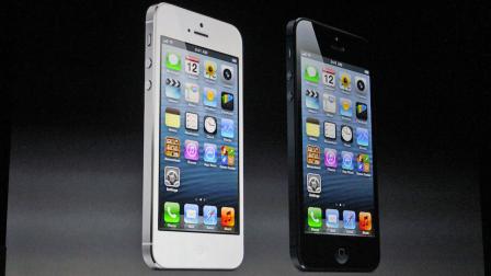 White and black iPhone 5 phones are shown in this photo taken at an Apple conference held in San Francisco on Wednesday, Sept. 12, 2012.
