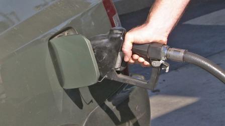 A person pumps gas in this undated file photo.