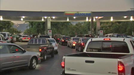 Vehicles line up to get gas at the Costco gas station in Burbank on Thursday, Oct. 4, 2012.