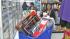 Savvy shoppers snap up Black Friday deals :: A woman pushes a full shopping cart in this November photo.