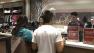 Shoppers make their purchases at Foreign Exchange at the Westfield MainPlace mall in Santa Ana on Wednesday, Dec. 26, 2012.