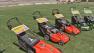 Electric lawn mowers are seen.
