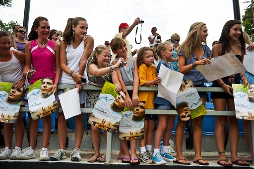 Fans gather to meet actor Zac Efron as he...