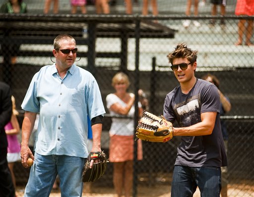 Zac Efron prepares to throw the ball as Atlanta...