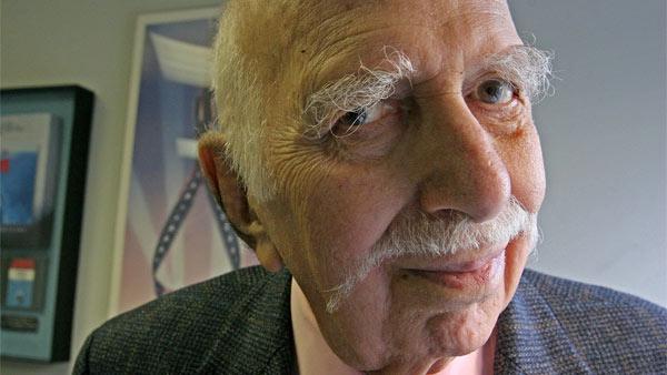 David Brown, author of 'Brown's Guide to the Good Life without Tears, Fears or Boredom' poses for a photograph in his office in New York Monday, Sept. 18, 2006.
